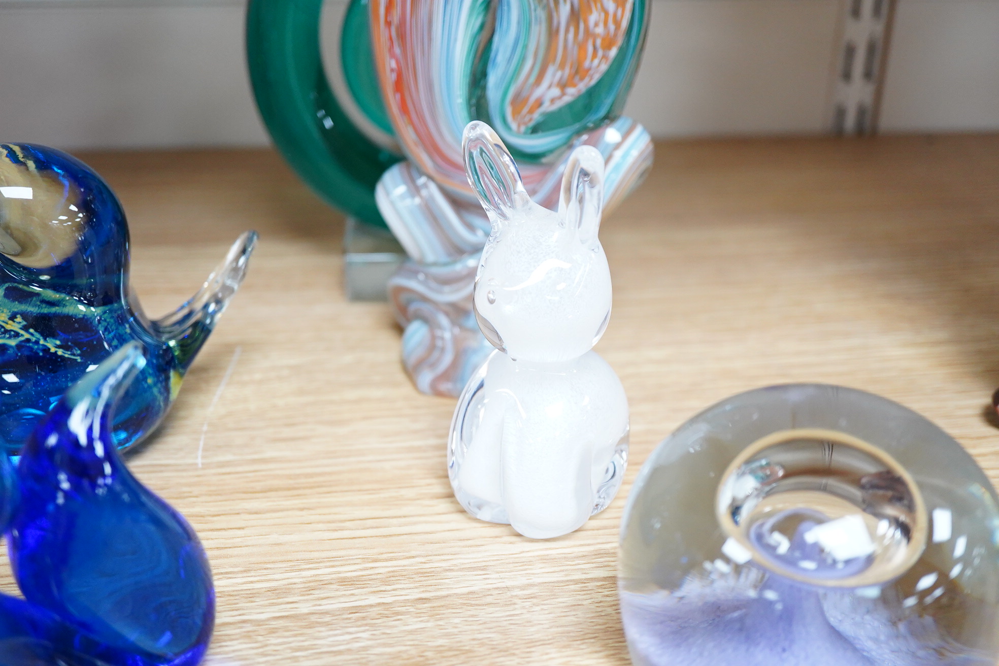 A large collection of 20th century paperweights to include Svaja, Mdina and some novelty examples in the form of animals, largest 27cm high
